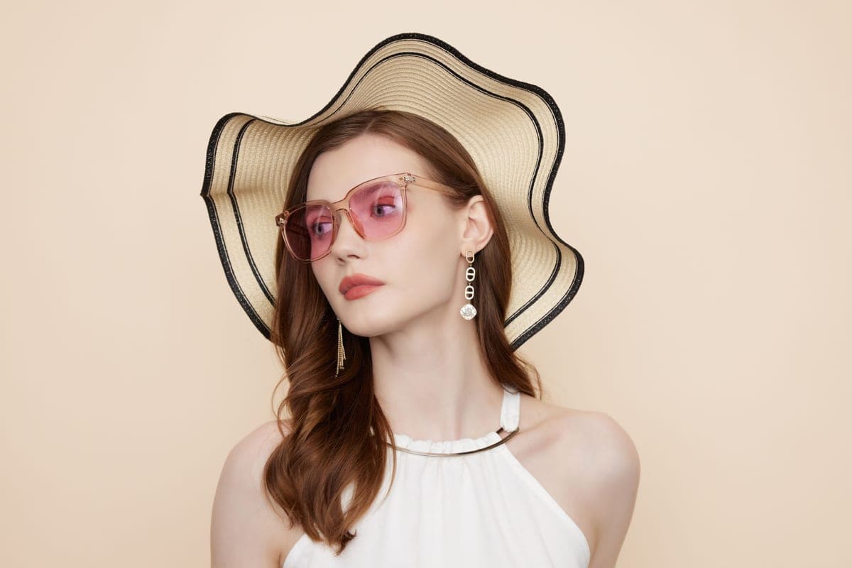 Wide-brim sun hat with a neck cape worn on an exposed trail