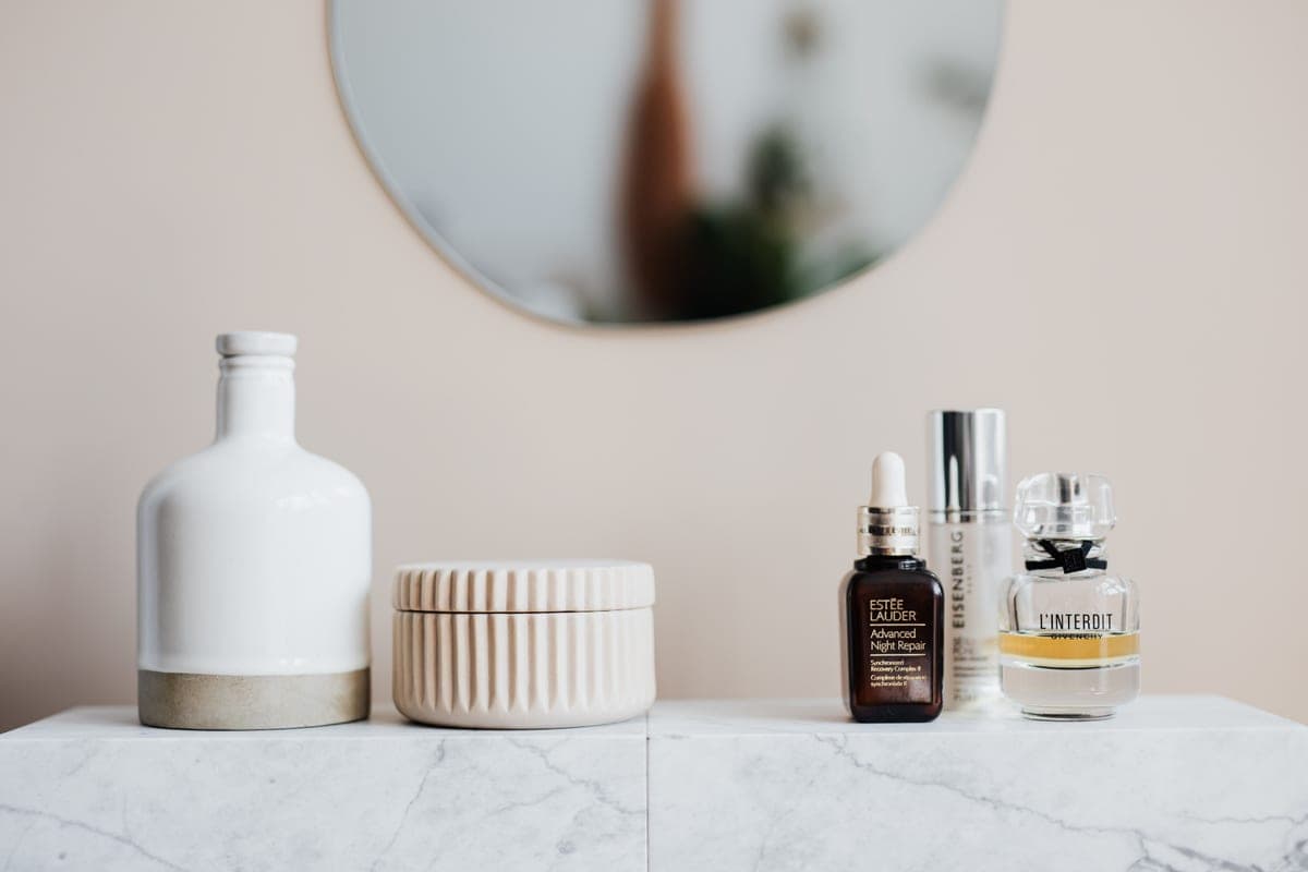 Plain fragrance-free sunscreen tube on a clean pale surface