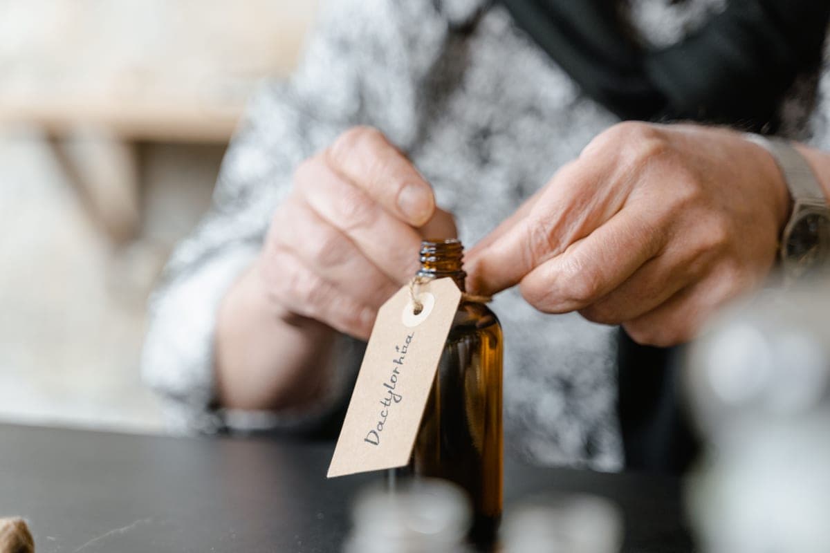 Sunscreen bottle turned to show the full drug facts panel