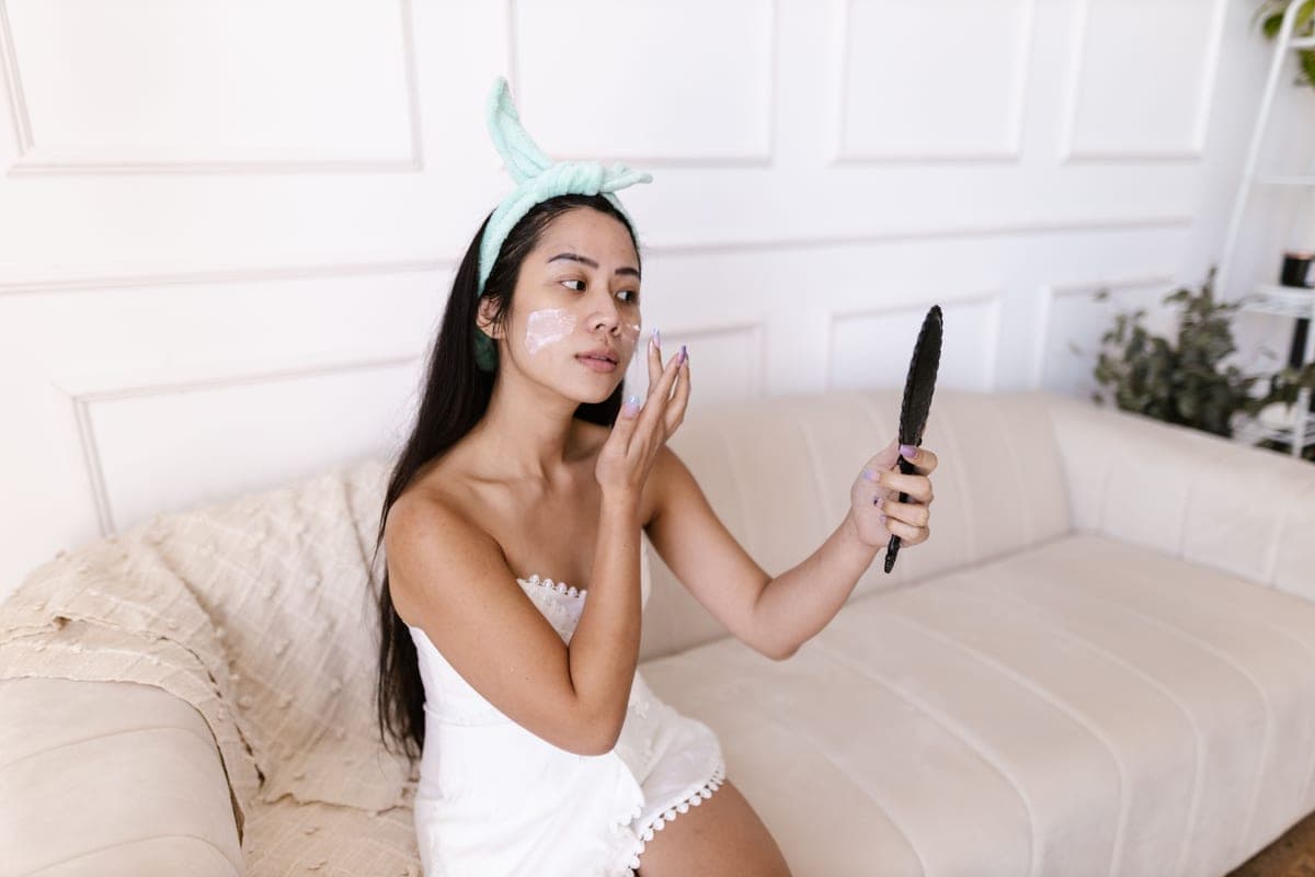 Lightweight face sunscreen tube on a clean bathroom shelf