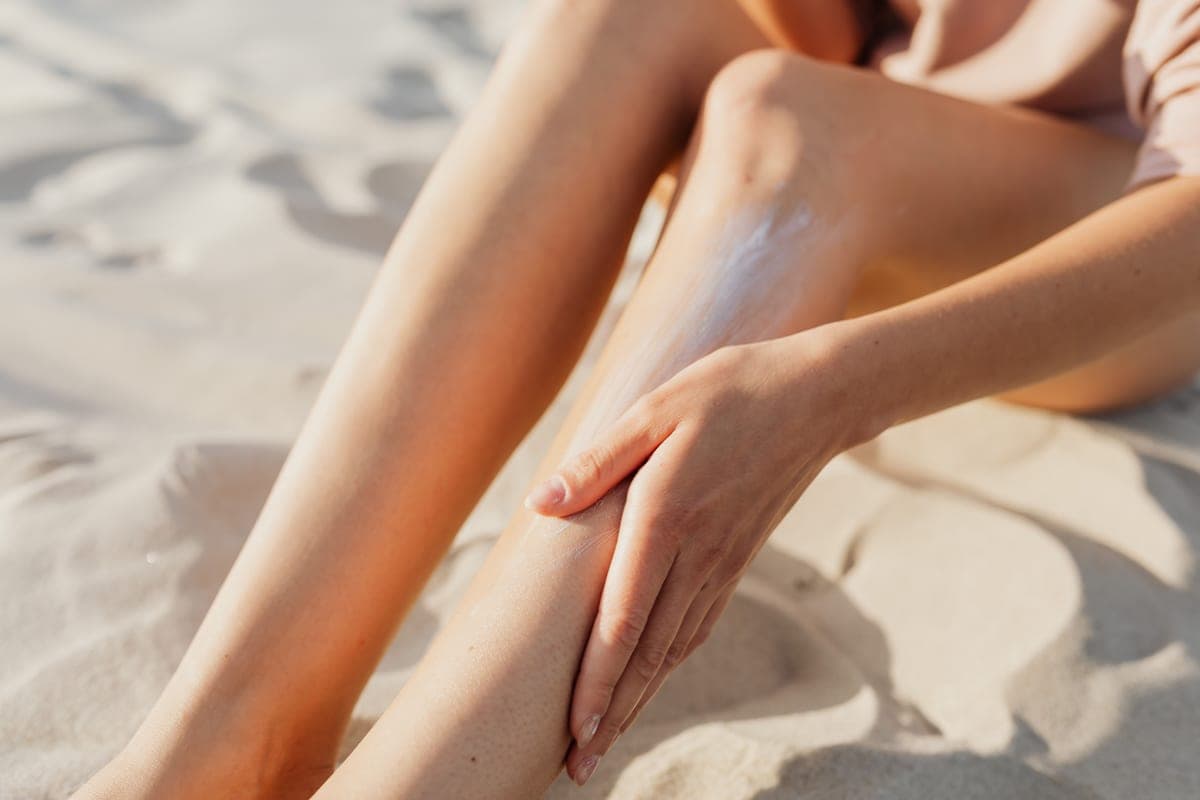 Thick white zinc sunscreen on a shoulder in direct sunlight