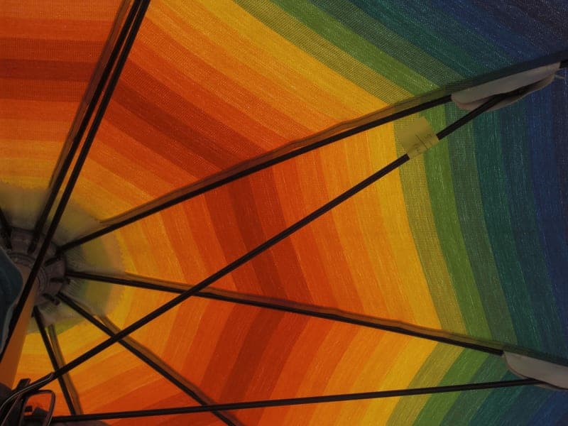 Sun canopy pitched on an open stretch of beach