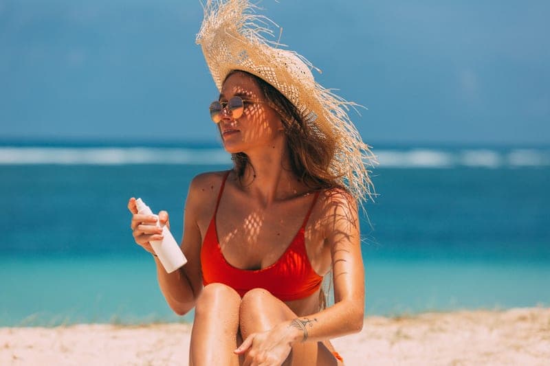 Botanical mineral sunscreen bottle in bright daylight
